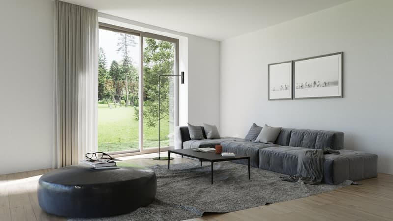 Spacious living room with large windows overlooking a lush green outdoor area, grey sectional sofa, coffee table, and artwork on the walls