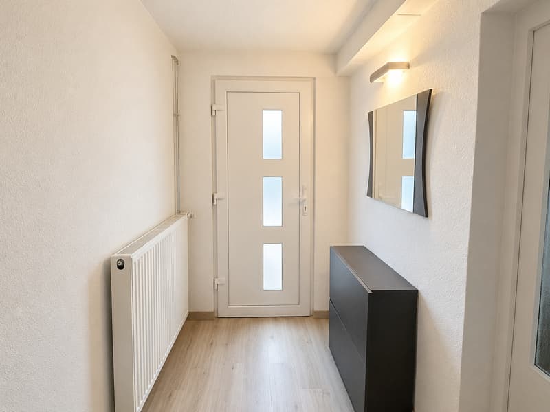 Maison bifamiliale charmante à Grandfontaine – 4.5 pièces avec garage et balcon (16)