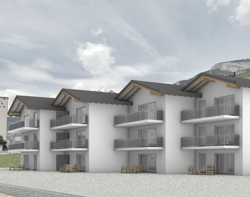 Modern apartment building with balconies, multiple floors, and a mountain view