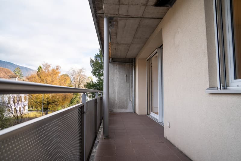 balcony with railings, tiled floor, and scenic mountain view
