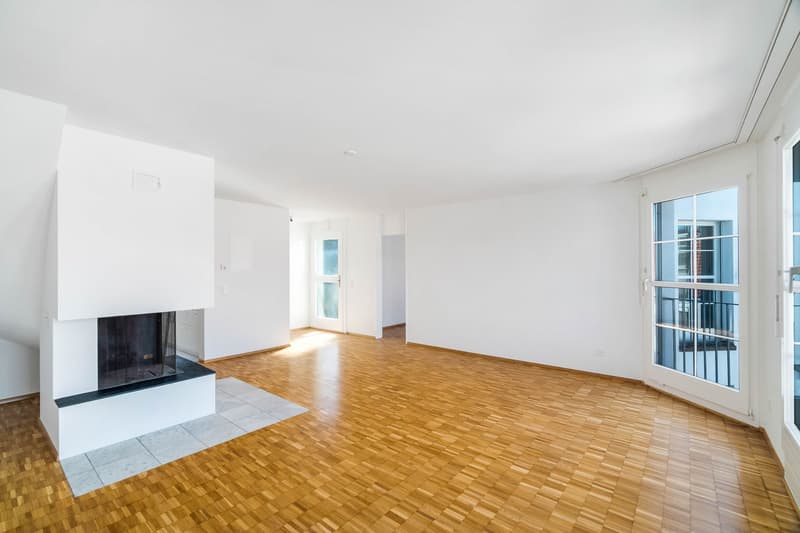 empty room, wooden floor, white walls, fireplace, sliding glass door, balcony