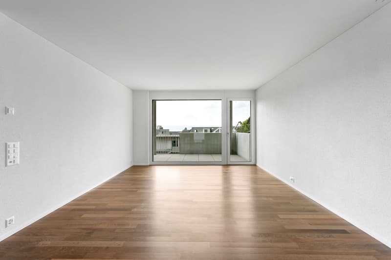 white walls, wooden floor, sliding glass doors, balcony, power outlets