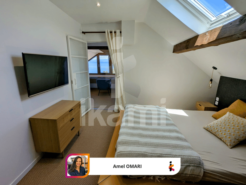 Duplex d'exception avec vue lac, terrasse et véranda (10)