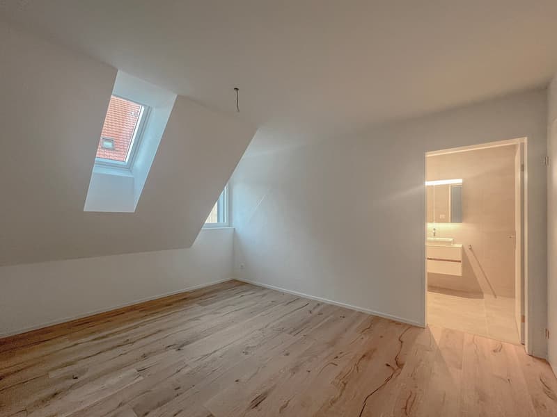 Spaziosa mansarda con ascensore direttamente nell'appartamento – nuovo edificio ad Aesch ZH (6)