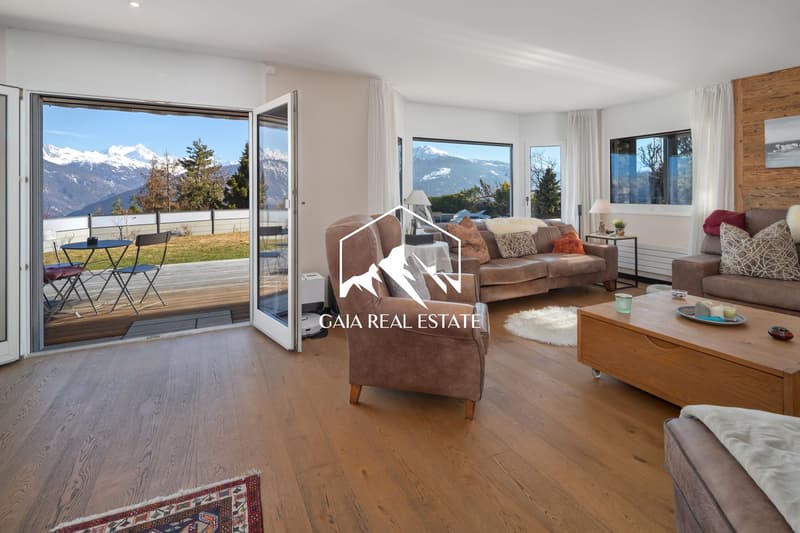 large windows, balcony, wooden floor, modern furniture, mountain view
