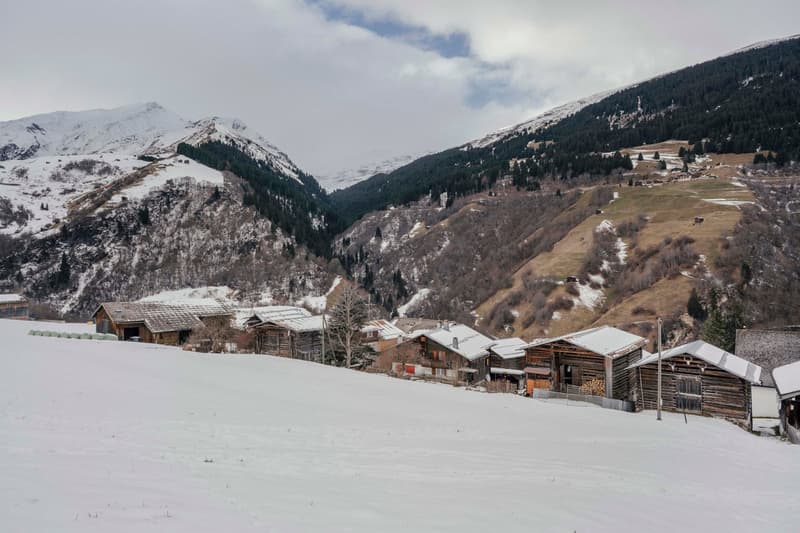 snowy mountains, wooden chalets, wooden huts