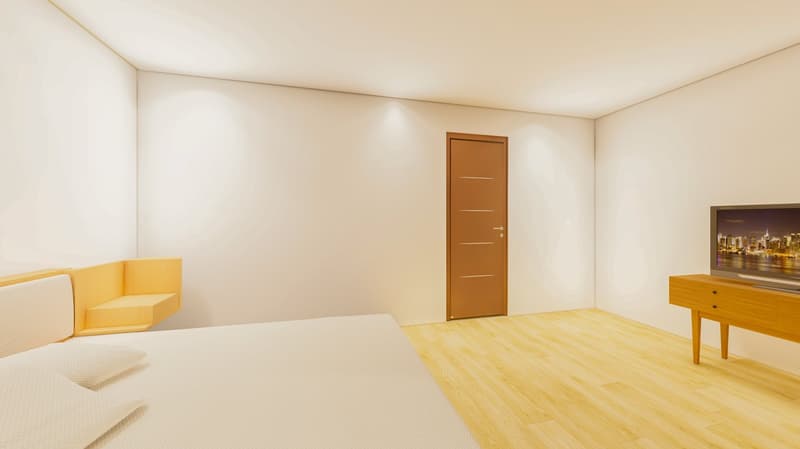 Bedroom with a bed, shelves, and TV
