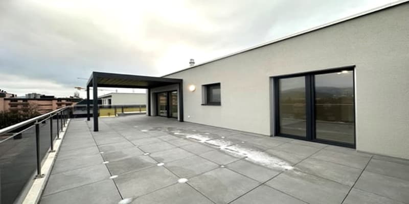 modern roof terrace with glass walls, metal fence