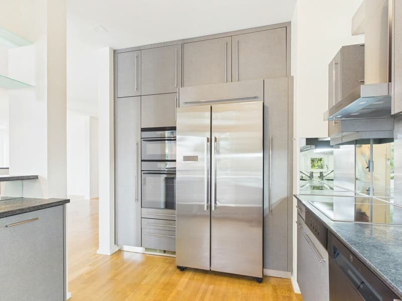 Stylish living on Bruderholz with chimney, balcony, terrace, and ornamental garden (16)