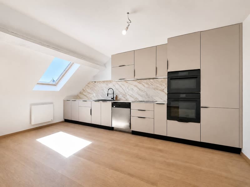 In the village center, 153 m2 attic with character (3)