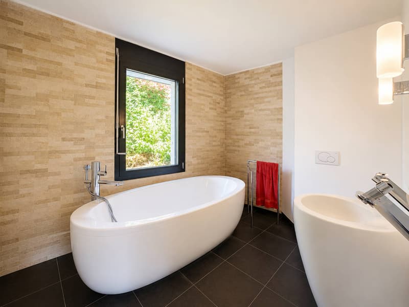 Villa a schiera contemporanea con giardini e vista aperta a Pully (7)