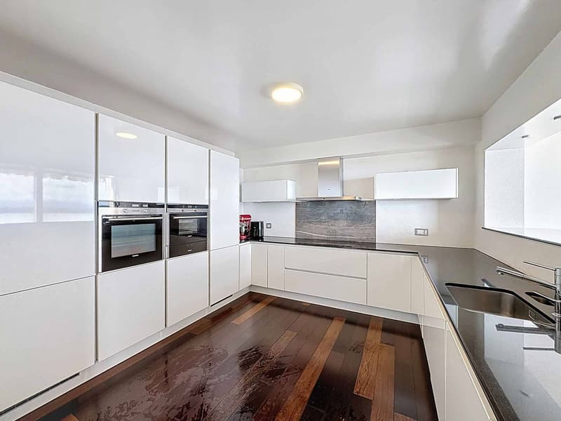 Penthouse di lusso con 6,5 locali che domina il lago e le montagne (2)