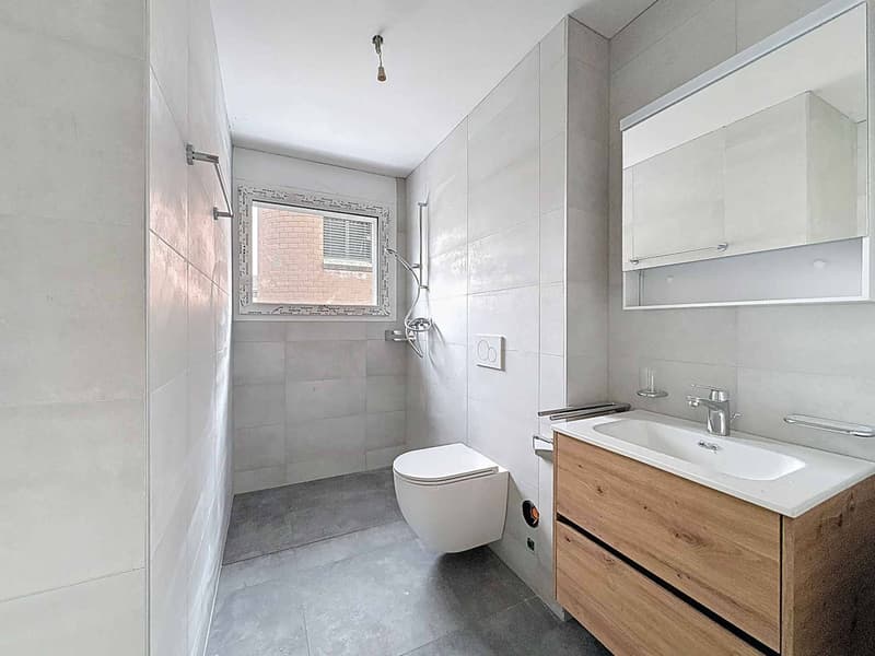 Appartement de 3.5 pièces neuf au rez-de-chaussée avec terrasse (6)