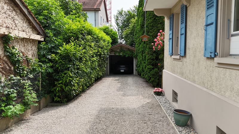 Villa aux volumes généreux et intimité préservée au coeur d'Yverdon (10)