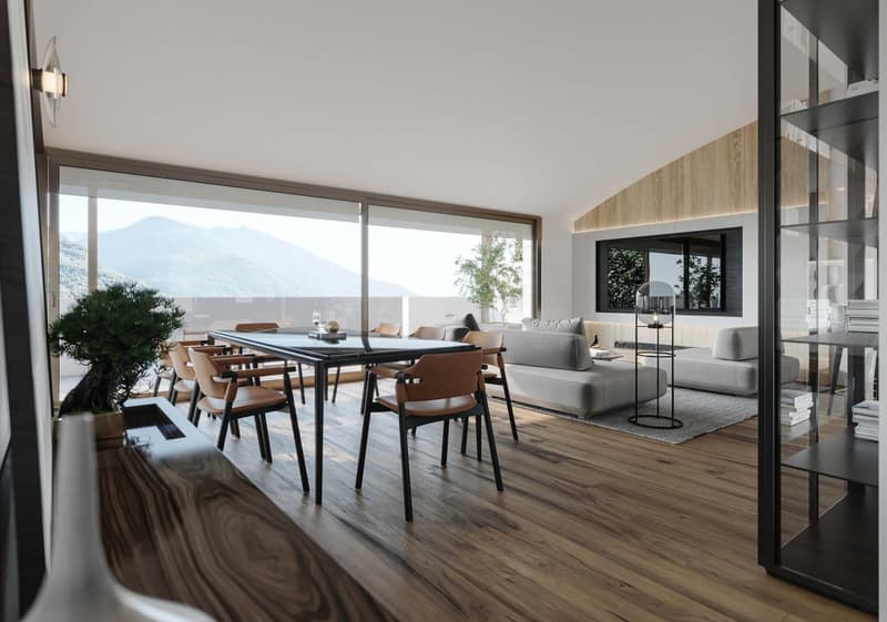 Open-concept living and dining area with large windows offering a scenic view, hardwood flooring, modern dining table and chairs, comfortable sofa and armchairs, and a TV stand with a mounted TV.