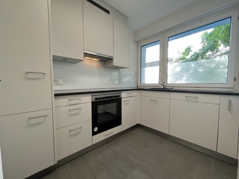 Tolle 2 Zimmer-Wohnung mit gedecktem Sitzplatz und Gartenanteil (2)