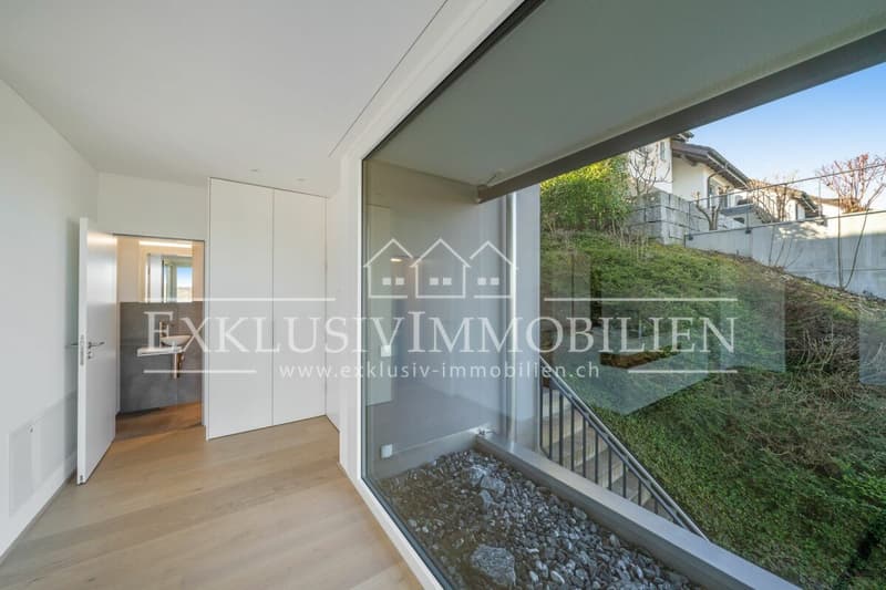 Exclusive living with lake and far-reaching views and a bright winter garden (4)