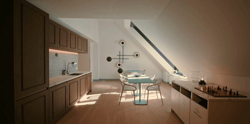 The image shows a combined kitchen and dining area with wooden cabinets, a kitchen sink, a dining table with chairs, and a modern light fixture on the ceiling. There is also a chess set visible on a cabinet in the background.