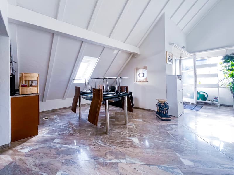 marble floor, wooden table, white walls, wooden cabinet, white refrigerator, window, skylight