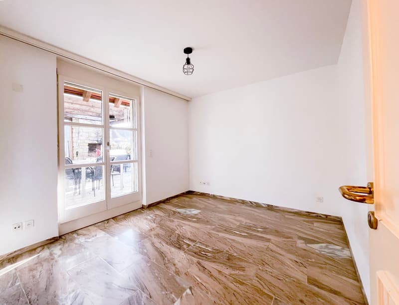 empty room, white walls, marble floor, sliding glass door, balcony view