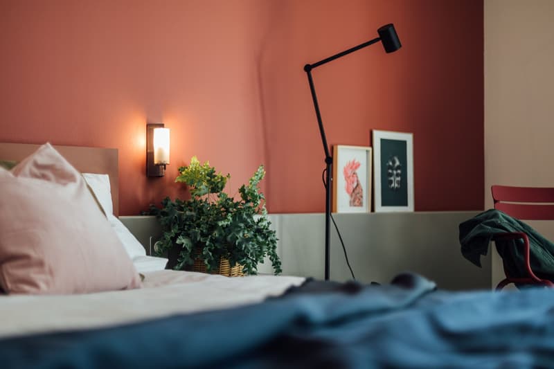 single bed, headboard, side lamp, wall art, potted plant, floor lamp, chair