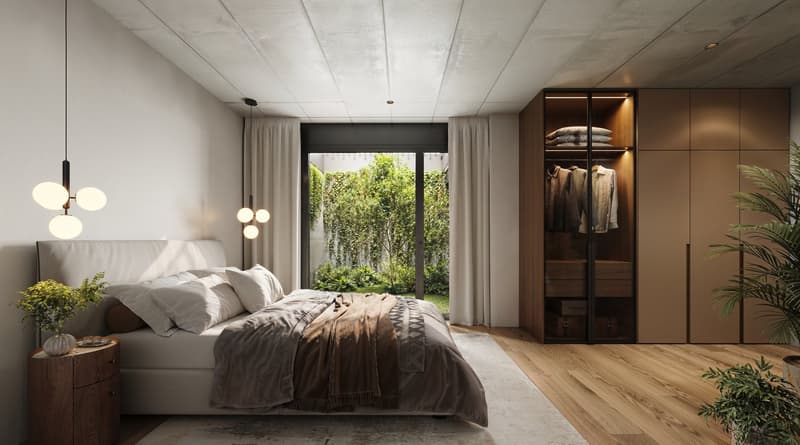 Bedroom with a bed, nightstand, and a large window with a view of a garden