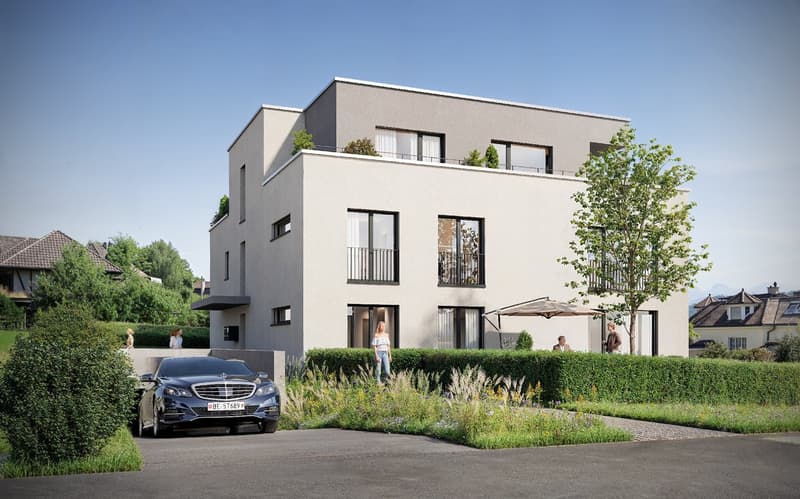 Modern two-story house with a terrace and balconies, grey exterior with white accents, large windows, and a central courtyard