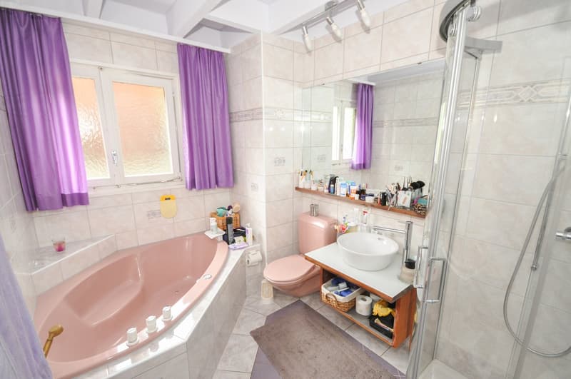 Bathtub, shower stall, vanity, toilet, window, storage shelf