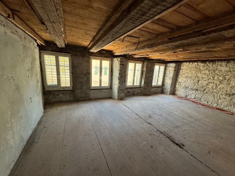 wooden floor, three windows, wooden ceiling