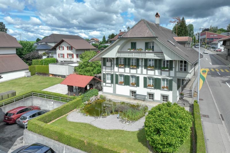 Historic Bernese farmhouse with four apartments and commercial space (1)