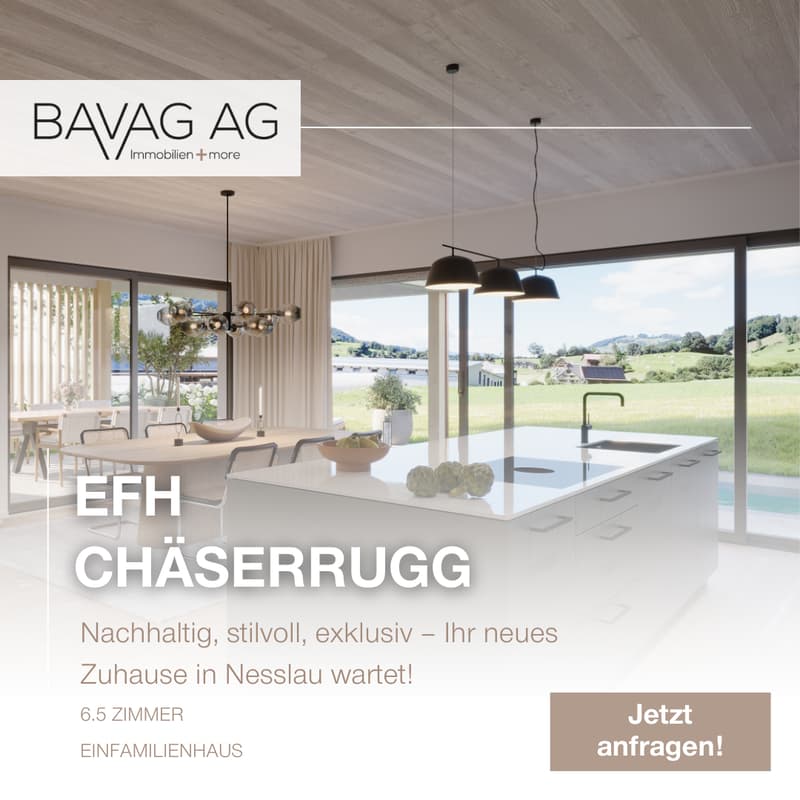 Open-plan kitchen with living area, large windows overlooking a scenic view, modern decor.