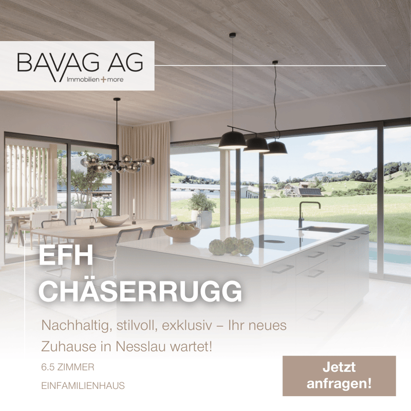 Open-plan kitchen with living area, large windows overlooking a scenic view, modern decor.
