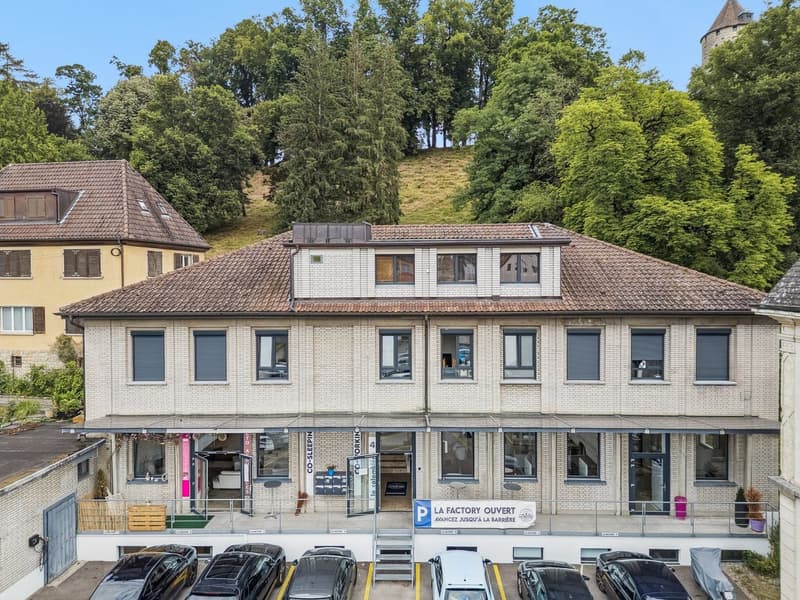 Magnificent rental building, renovated in the center of Porrentruy (2)