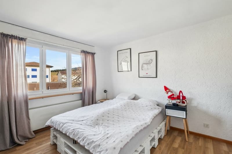 Immeuble avec 2 appartements, 1 salon de coiffure, un terrain à bâtir (10)