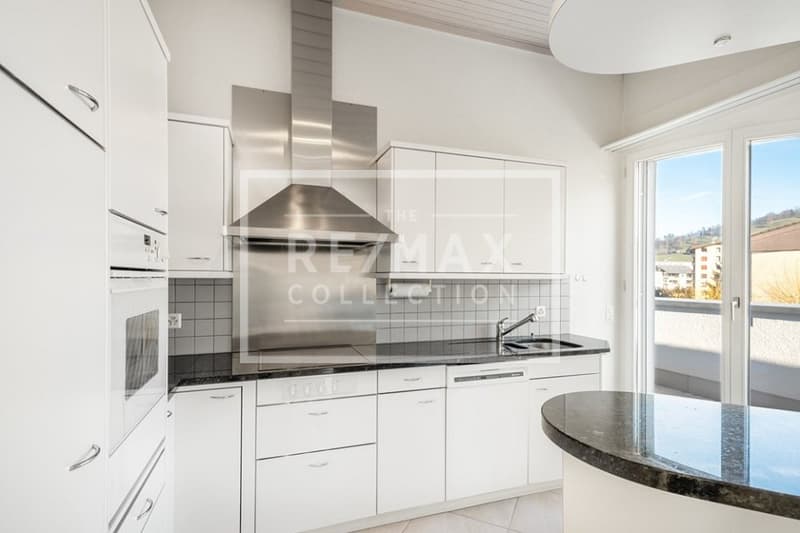 A home above the roofs of Küssnacht, living like in a single-family house with panoramic balconies (5)