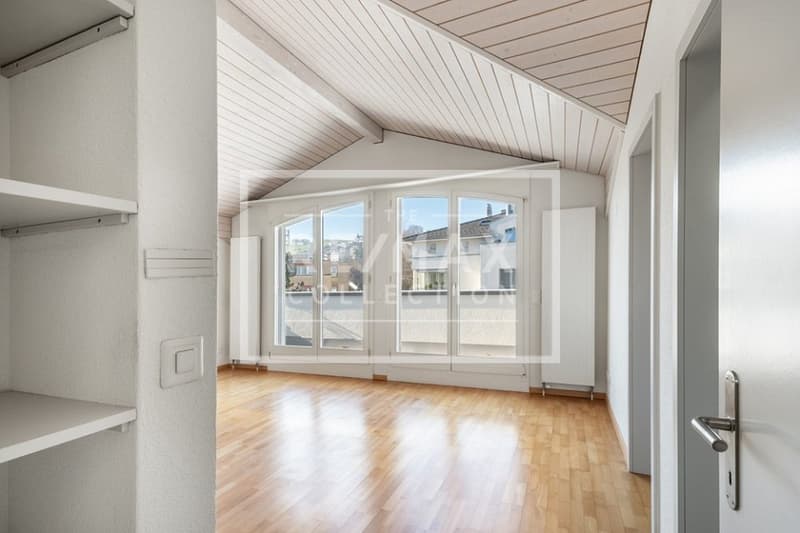 A home above the roofs of Küssnacht, living like in a single-family house with panoramic balconies (10)