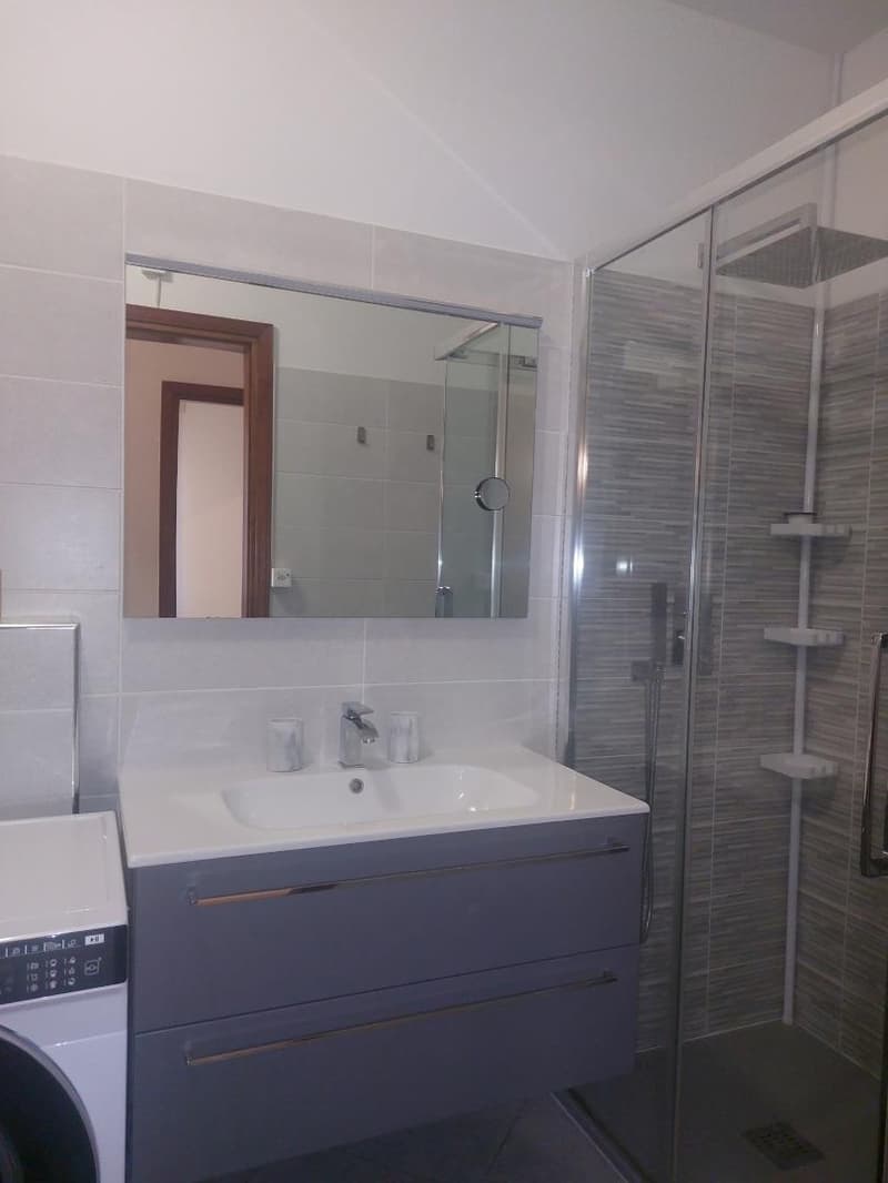 Lugano : Appartement 3.5 pièces lumineux avec vue sur le lac et la ville de Lugano (11)