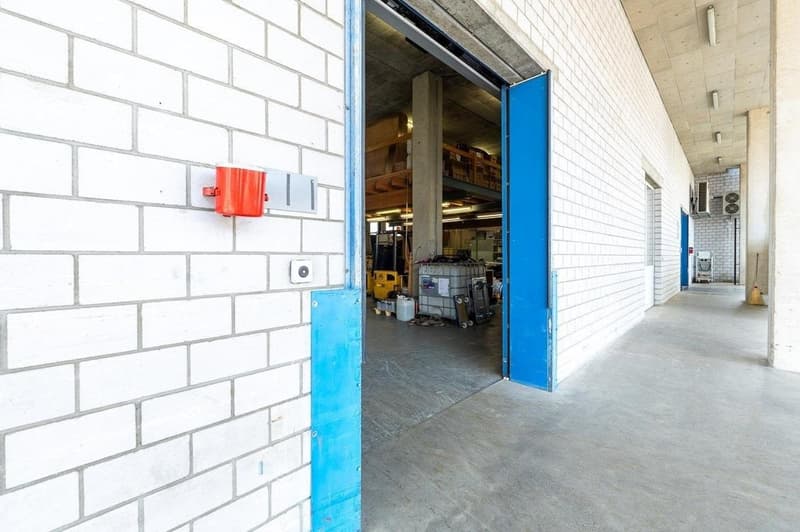 Empty parking area with storage boxes and shelves