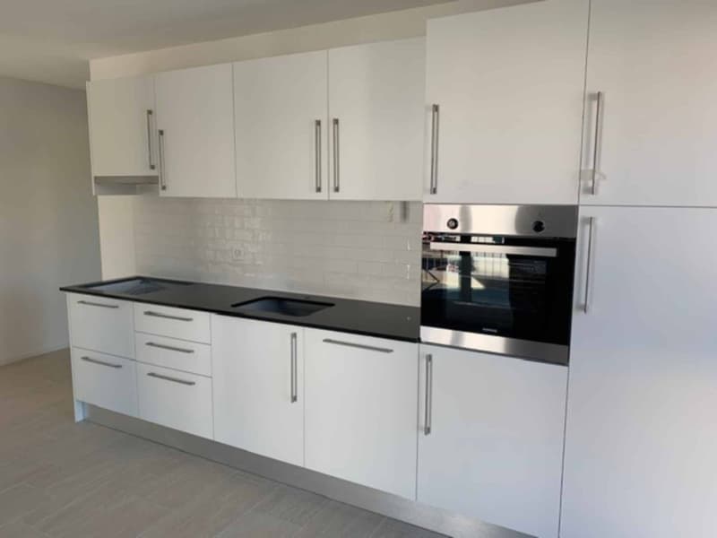 Appartement de 2,5 pièces avec balcon et 2 places de parc (4)