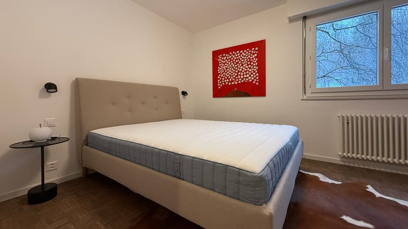 Chambre principale avec lit double / Master bedroom with double bed / Camera da letto principale con letto matrimoniale