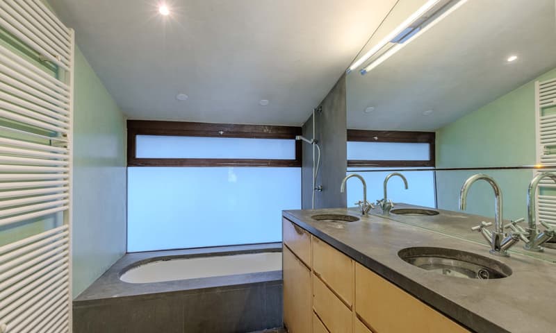 Ampio appartamento di 5.5 locali con balcone a Carona (9)
