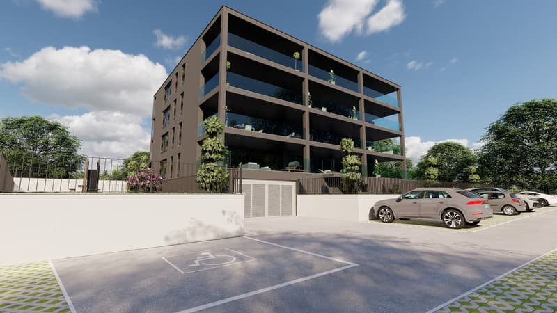 4 story building, modern architecture, multiple garages, white walls, cars parked in front, plants and trees around