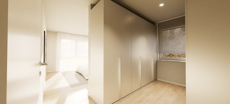 a hallway with wooden floors, tall white wardrobes, window with blinds