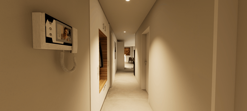 narrow hallway with walls, wooden shelves, intercom system