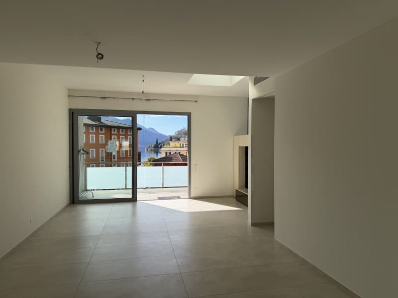 Elegante attico, grande terrasse ensoleillée avec vue sur le lac (5)