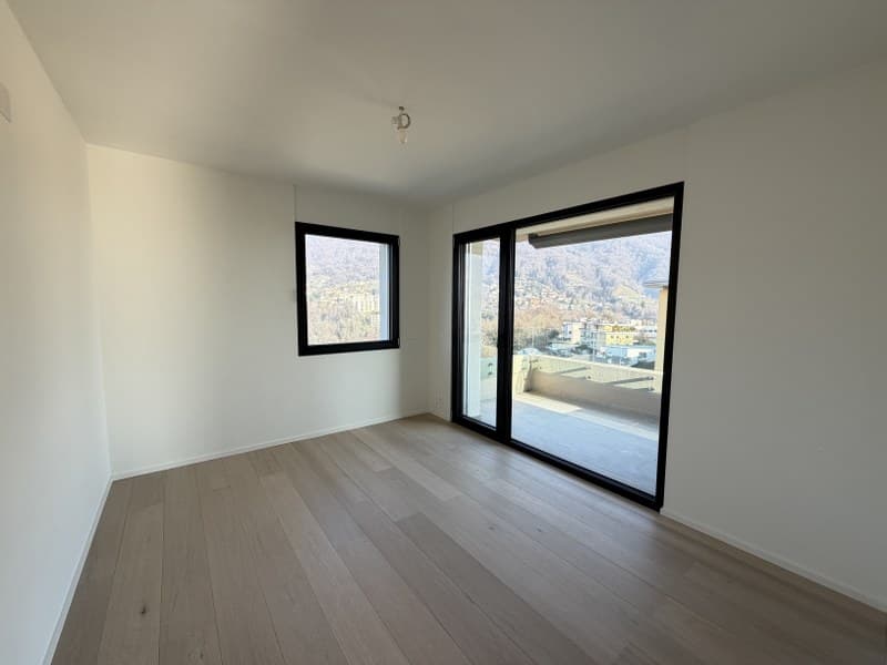 APPARTAMENTO ATTICO 4.5 LOCALI CON VISTA LAGO IN ELEGANTE PALAZZINA (8)