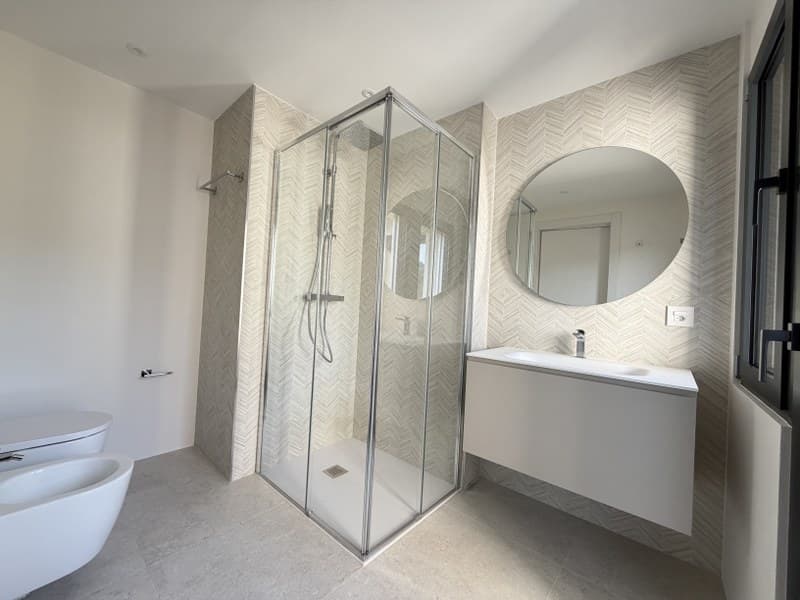 APPARTAMENTO ATTICO 4.5 LOCALI CON VISTA LAGO IN ELEGANTE PALAZZINA (10)
