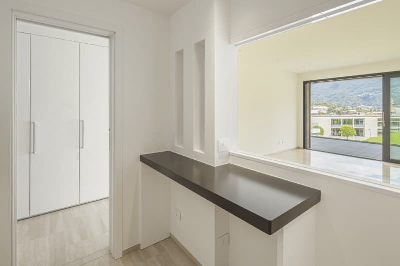 APPARTAMENTO 3.5 LOCALI CON GRANDE TERRAZZA E VISTA APERTA SULLE MONTAGNE (4)