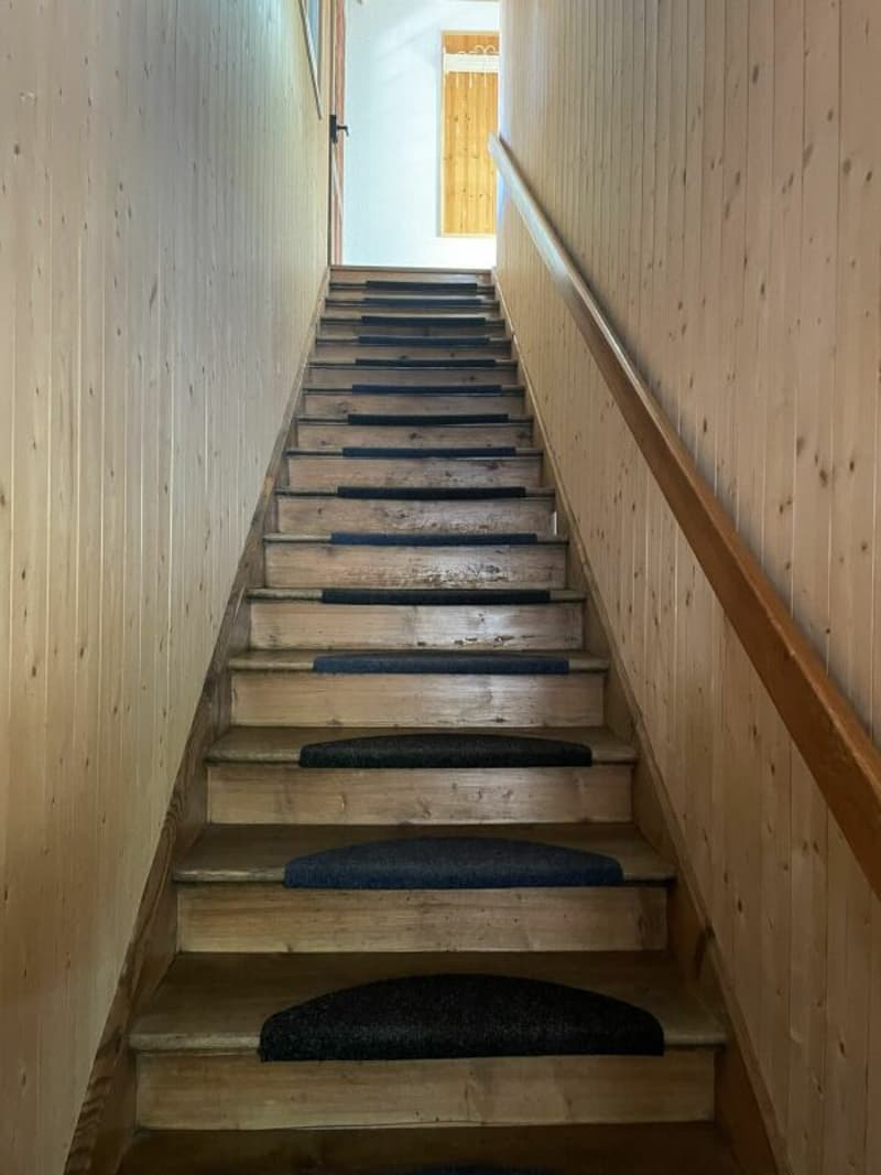 Treppenaufgang zur Dachwohnung