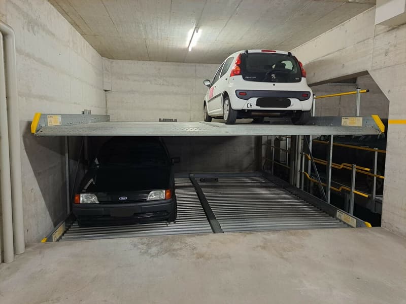 Affittasi posteggio in autorimessa in via San Gottardo 70 a Minusio (1)